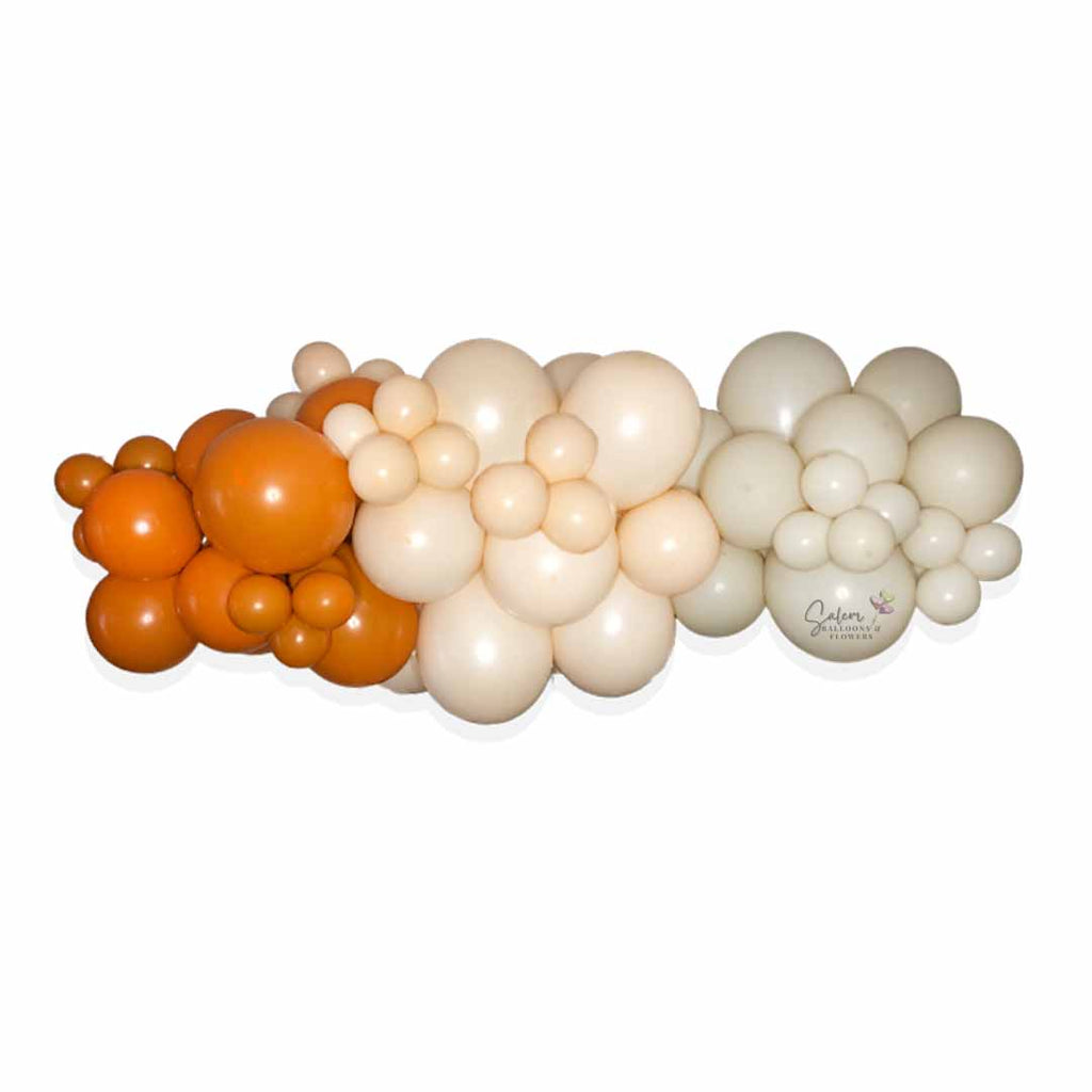 5 ft. organic balloon garland in 3 colors, orange, beige and blush. Salem Oregon balloon decor.