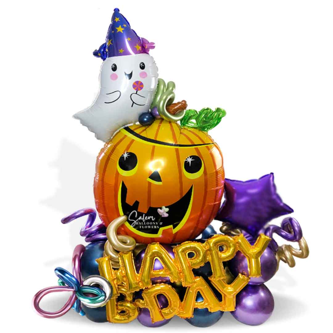 Halloween themed balloon bouquet. With a pumpkin balloon with a Happy birthday balloon. Oregon balloon decor.
