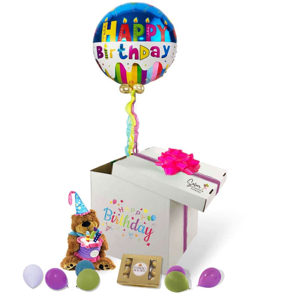 Surprise Balloon Box birthday gift. Lift the lid and let the happiness fly! A magical Happy Birthday helium balloon floats up as it reveals a cuddly musical plushy that plays a festive Happy Birthday tune and a box of delicious chocolates. Balloons Salem Oregon