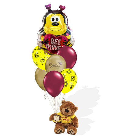 Valentine's balloon bouquet with teddy bear holding a bee mylar balloon and a set of latex helium balloons. His T-shirt has a "Be my Honey!" message embroidered. Salem Oregon balloon delivery