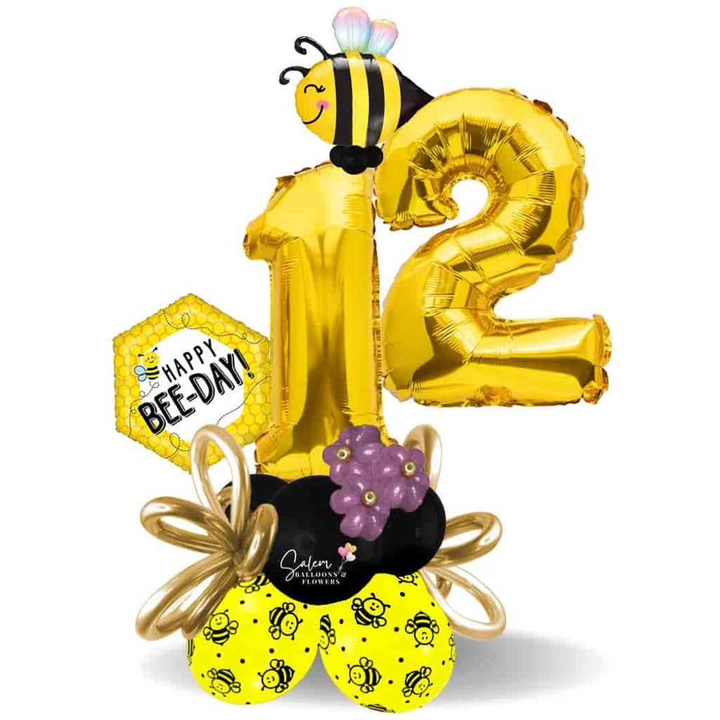 Happy birtday large gold numbers balloon bouquet. With a Bees theme. Deluxe style includes a set of helium balloons. Balloon delivery in Salem Oregon and nearby cities. Helium balloons Salem Oregon.