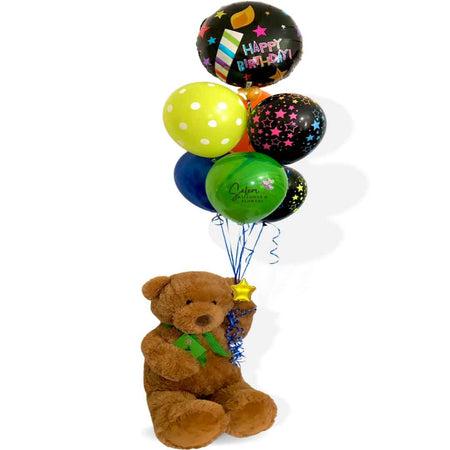 Large teddy bear holding a set of helium-filled balloons with a "Happy Birthday" message. Balloon delivery in Salem Oregon and nearby cities.