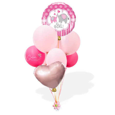 "It's a Girl" Helium-filled balloon bouquet in various shades of pink.  Featuring a Mylar balloon with a pink and a gray elephants. Oregon Balloon delivery.