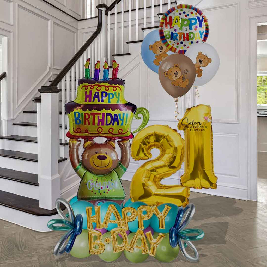 6-7 Ft tall number balloon bouquet with large teddy bear holding a balloon cake and a set of helium balloons. Birthday balloons delivery in Salem Oregon and nearby cities.