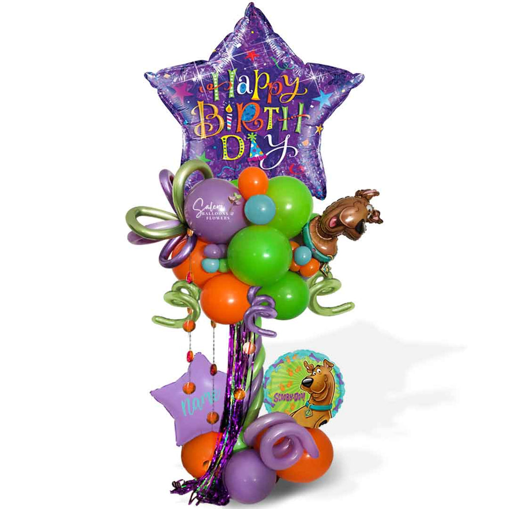 Scooby Doo themed birthday balloon column in purple and orange. Oregon Balloon Decor.