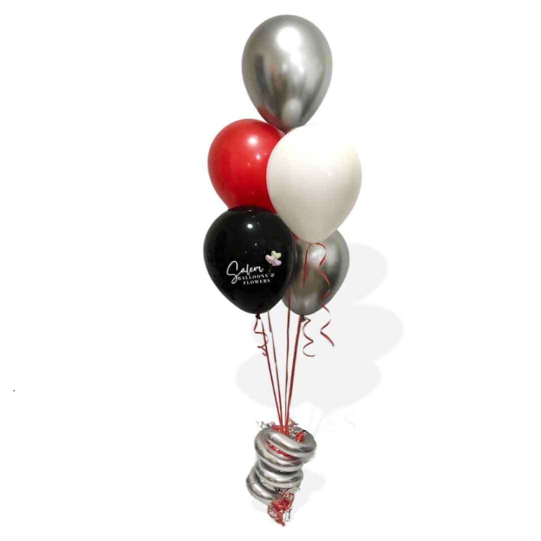 Balloon centerpiece made of 5 balloons in silver, red, white and black, decorated with a curly balloon. Salem Oregon balloon decor.