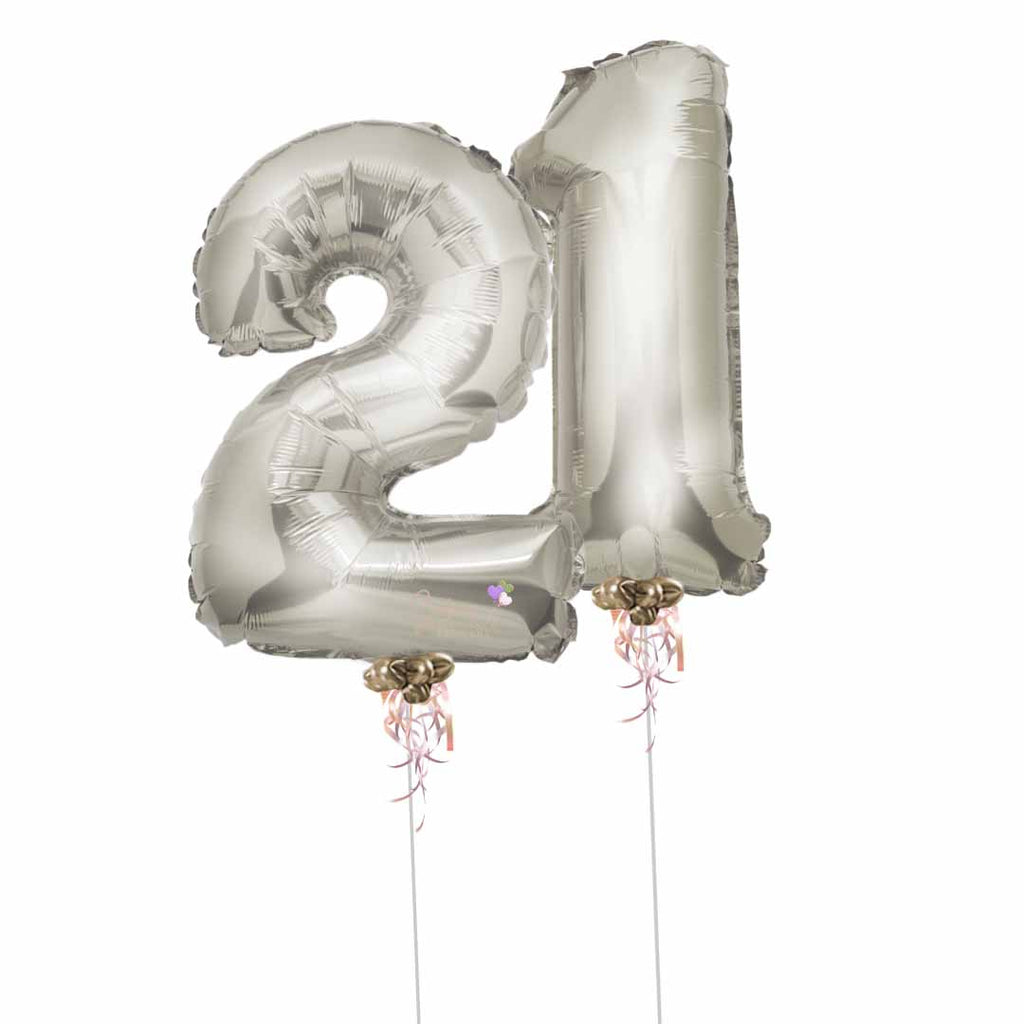 Two Silver balloon numbers with helium. Balloon delivery in Salem Oregon and nearby cities.