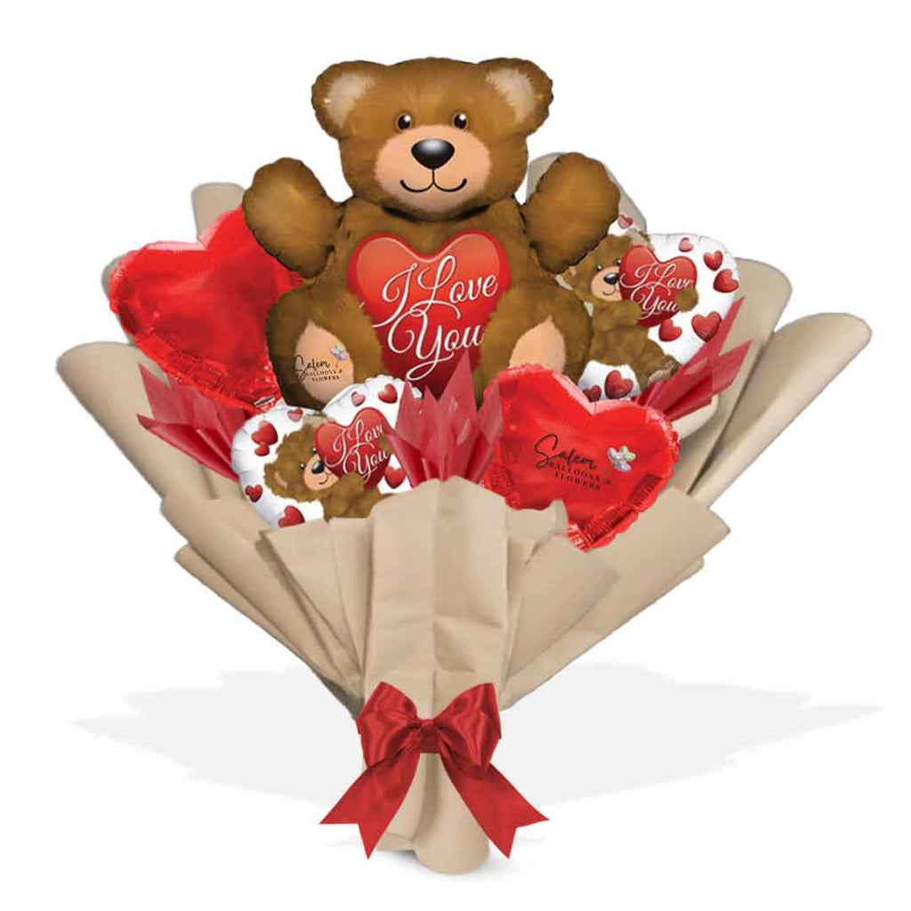 Wrapped balloon bouquet. Featuring a large teddy bear and heart balloons with an 