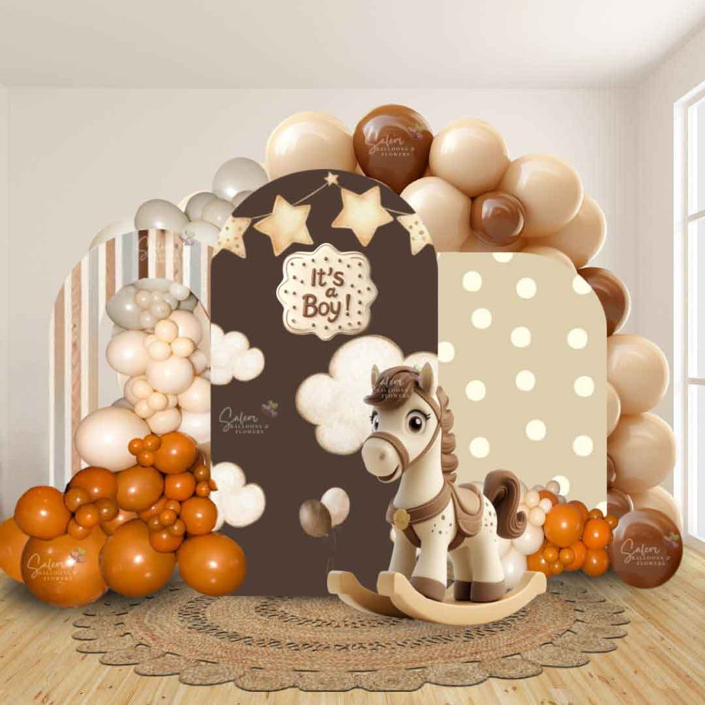 Mocha and beige baby shower balloon decoration. Features balloon garlands, backdrops, and a rocking horse cutout. Customizable for boy or girl! in Salem, Oregon, and nearby cities like McMinnville, Portland, Wilsonville, and Lake Oswego.