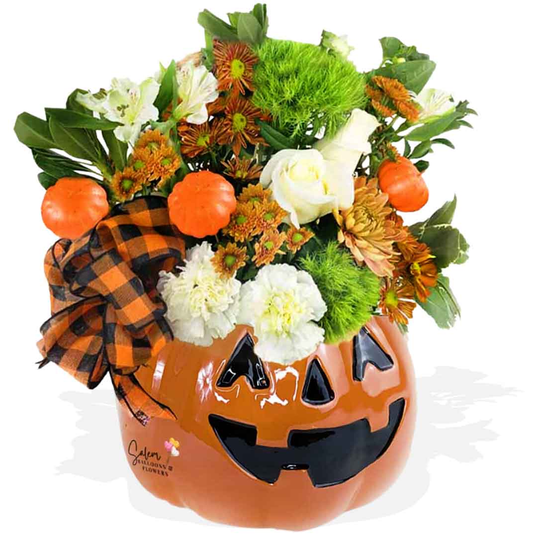 Fall flowers in a ceramic pumpkin head vase. Flower delivery Salem Oregon