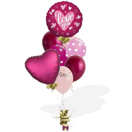 Pomegranate heart helium balloon bouquet. In various shades of pink. Valentines day balloon delivery. Salem Oregon