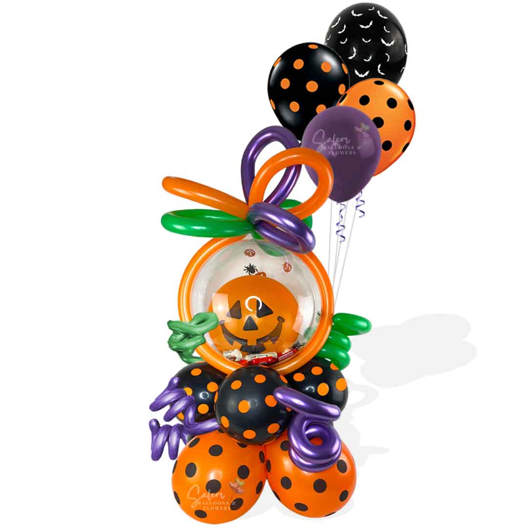 Pumpkin head stuffed bubble balloon. Filled with halloween candy and decorated with helium balloons. Oregon balloon delivery. 