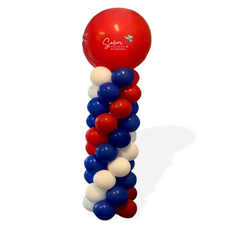 Round top balloon column in a red, white and blue swirl. Oregon Balloon decor.