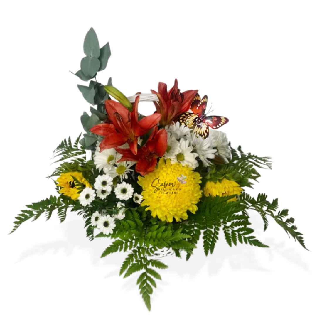 Seasonal flower basket with an array of beautiful flowers decorated with butterflies. Salem Flower delivery.