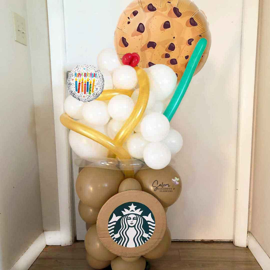 picture of a 4 Ft tall Starbucks Latte inspired balloon bouquet. with whipping cream and a chocolate cookie balloon. Delivery in Salem Oregon and nearby cities.