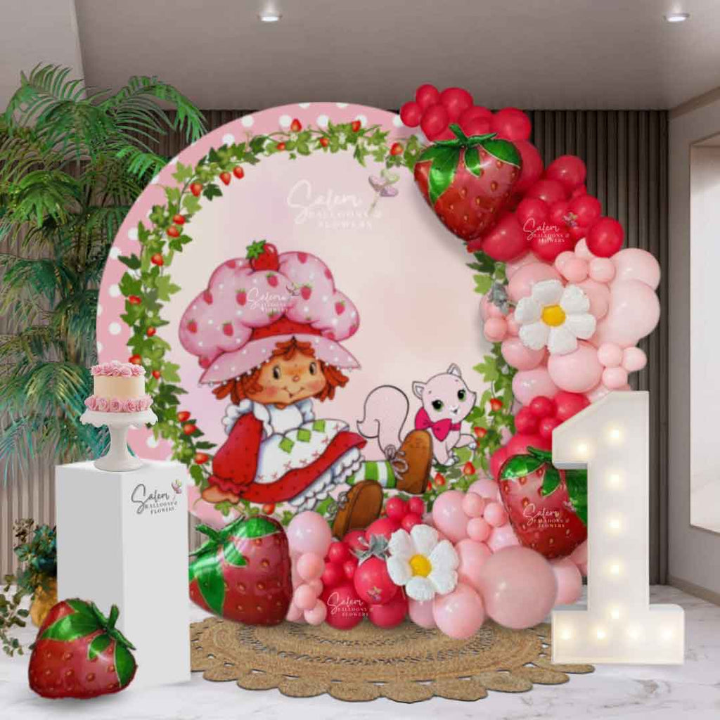 My berry 1st Birthday themed balloon decor. Strawberry Shortcake round backdrop on a hoop decorated with balloon garland. Balloon decor. Oregon