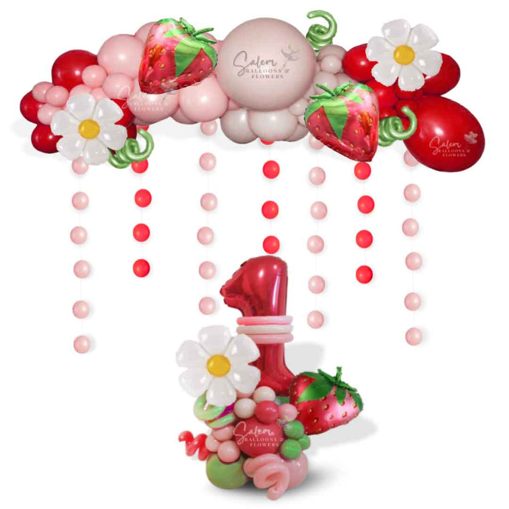 Strawberry Shortcake themed balloon decoration, featuring a balloon garland, number balloon bouquet. in pinks, red and a touch of green. Balloon Decor. Oregon.