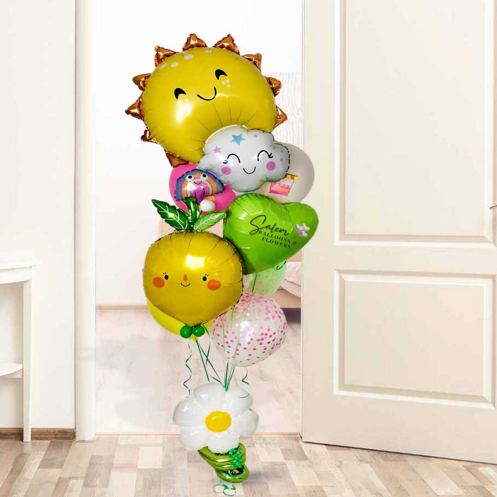 Sunny colorful balloon bouquet, featuring a sun, clouds, lemon, heart and flower balloons. Oregon Balloon Delivery.