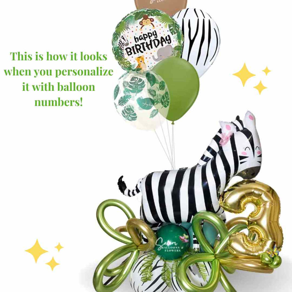 Safari themed balloon bouquet, featuring a zebra standing on a base of balloons with balloon numbers and helium balloons. Balloons delivery Salem Oregon and nearby cities.