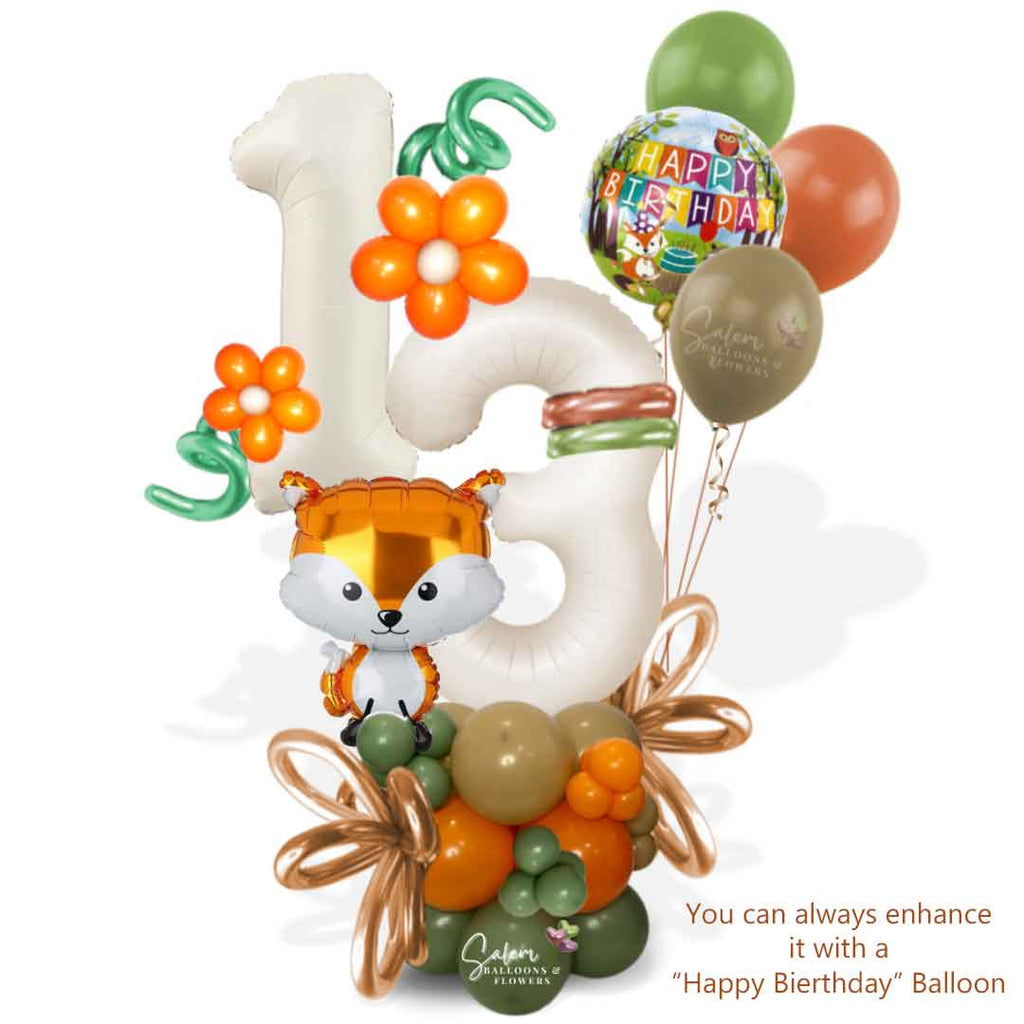 Woodland themed balloon bouquet with 2 large balloon numbers, in a green, orange and beige color palette. Featuring a cute Fox shaped balloon and a Happy birthday balloon. Balloons Salem Oregon
