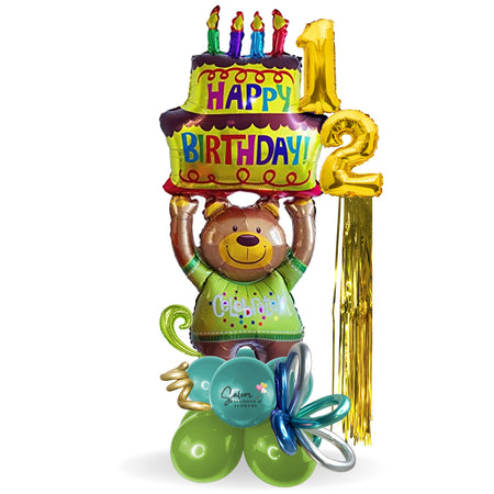 Numbers balloon bouquet a gift that never goes out of style. Featuring an extra large teddy bear balloon wearing a T-shirt with the word "Celebrate" as he carries a huge cake with a "Happy Birthday" phrase. Delivery Balloons Salem Oregon and nearby cities.