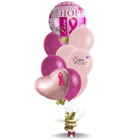 Get well helium balloon bouquet. Cancer awareness balloons. Featuring a Mylar balloon with a "Courage, love & hope" message and a set of bright and colorful helium balloons, anchored to a decorated weight.