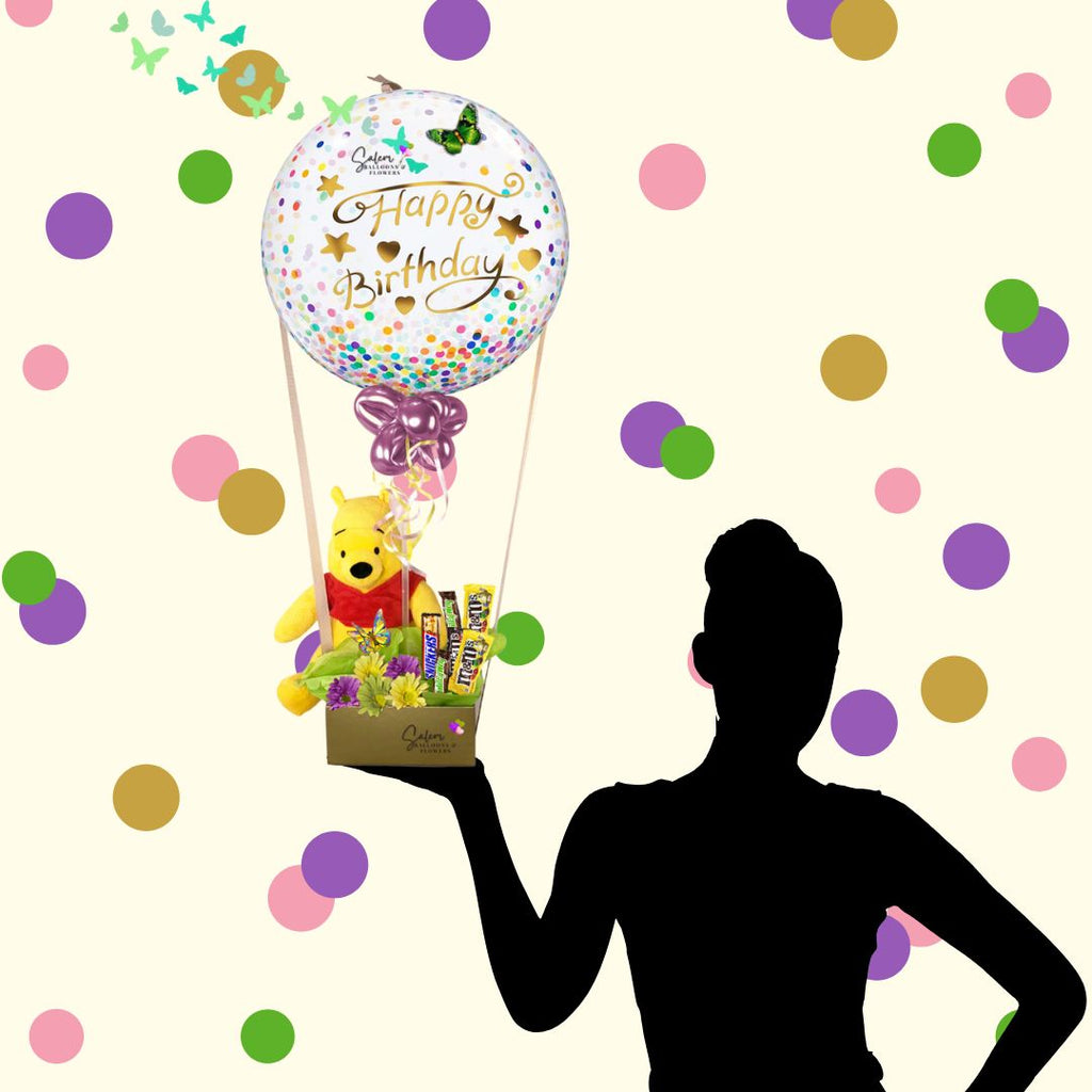 Happy birthday confetti bubble balloon gift. Featuring an adorable Pooh plush riding a hot air shaped balloon arrangement full of chocolates. Balloon delivery in Salem Oregon and nearby cities.