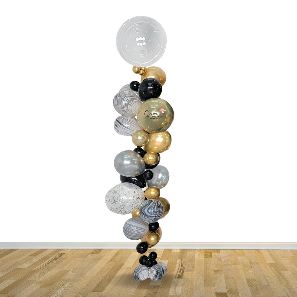 Helium balloon column. Single balloon fall. Salem Oregon balloon decor. Balloons Salem Oregon. Salem Oregon balloon delivery.