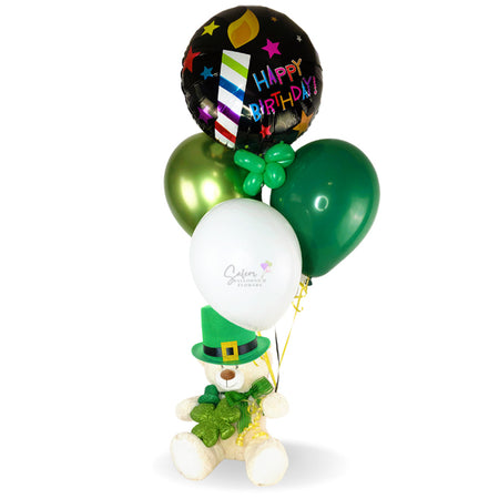 Happy Birthday plush holding helium balloons, gift. Featuring a cute teddy bear holding a set of helium balloons and a Mylar balloon with a happy birthday message on one paw. The perfect gift for your favorite St. Patrick's Day birthday one!  Delivery available in Salem Oregon and nearby cities.